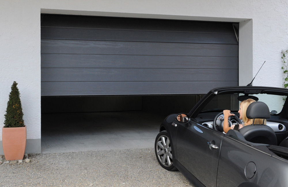 Automated garage door opening for a vehicle